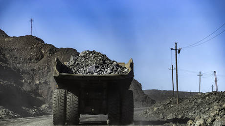 FILE PHOTO: A dump truck at an iron ore mine in Poltava, Ukraine.