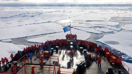 FILE PHOTO: Tourists travels on board the 50 Years of Victory nuclear icebreaker during a voyage to the North Pole, Arctic.