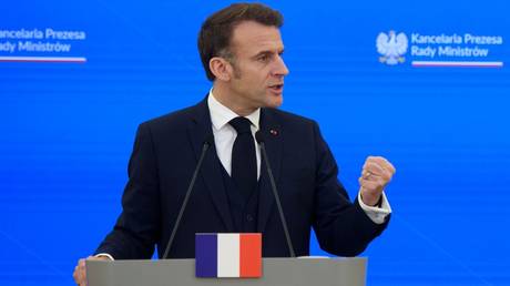 FILE PHOTO: French President Emmanuel Macron speaks during a press-conference.