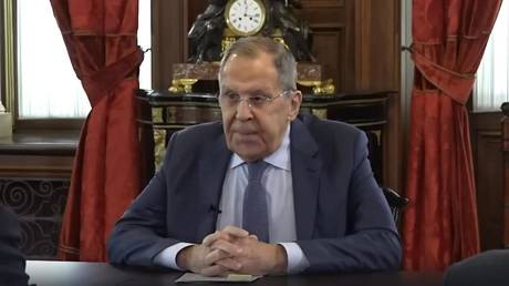 Russian Foreign Minister Sergey Lavrov is interviewed by podcasters.